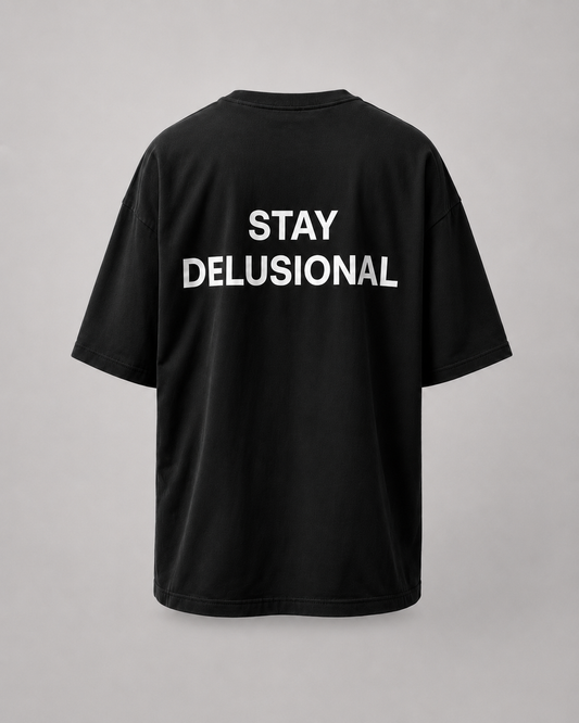 STAY DELUSIONAL | TEE